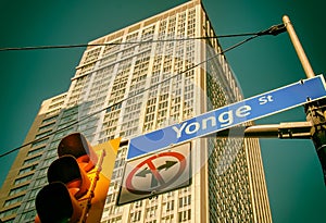 Yonge Street sign with buildings in background photo