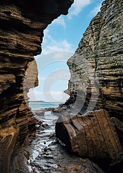 Yongmeori Beach sandstone cliff rock formation in Jeju Island, Korea