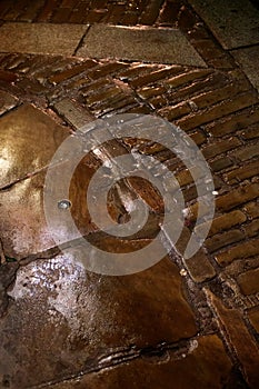 View of a wet pavement in the Shambles area of  York, North Yorkshire on February 19, photo