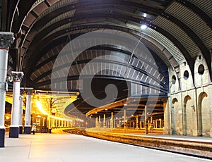 York railway station with empty platforms at night photo