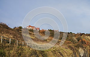 Yorkshire, England, Robin Hood`s Bay - houses and meadows.