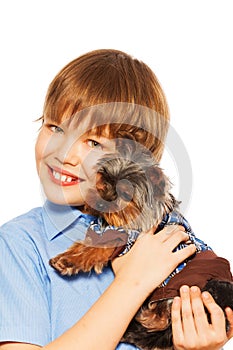 Yorkshire Terrier in pullover with smiling boy