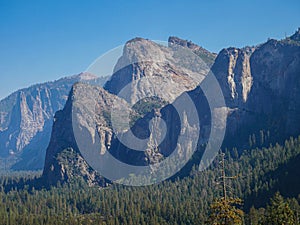 Yosemite national park, Tunnel view, El Capitan cliffs and granite rocky landscapes, giant sequoia and muir forest grove