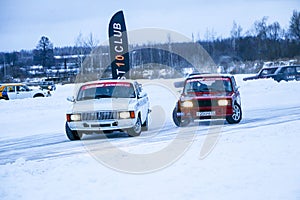 YOSHKAR-OLA, RUSSIA, JANUARY 11, 2020: Winter car show for  Christmas holidays for all comers - single and double drift, racing on