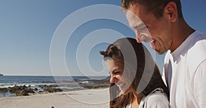 You adult couple relaxing at the seaside