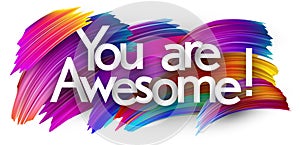 You are awesome paper word sign with colorful spectrum paint brush strokes over white