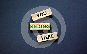 You belong here symbol. Concept words You belong here on beautiful black background. Diversity, business, inclusion and belonging