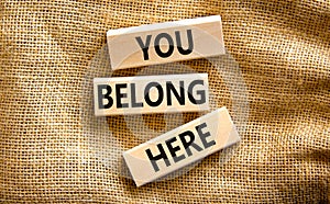 You belong here symbol. Concept words You belong here on beautiful canvas background. Diversity, business, inclusion and belonging