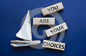 You can do it symbol. Concept words You can do it on wooden blocks. Beautiful deep blue background with boat. Business and You can
