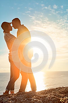 You can never have too much romance. a happy young couple sharing a romantic moment outdoors.