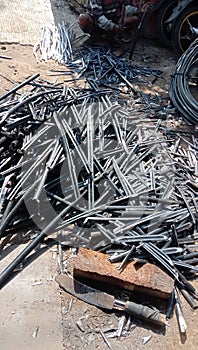 You can see cable skins being peeled off and scattered on the floor in an old iron factory