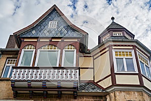 You can see the facade of a historic house with half-timbered architecture