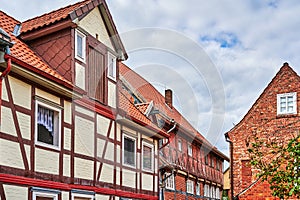 You can see the facade of a historic house with half-timbered architecture