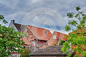 You can see the facade of a historic house with half-timbered architecture