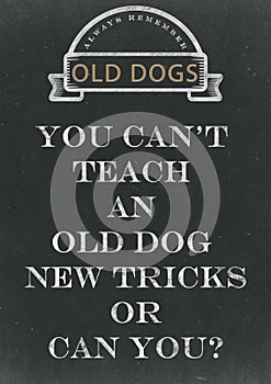 You Can't Teach An Old Dog New Tricks Hand Written On A Chalkbo