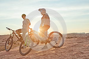 You cant beat a day of mountain biking. Full length shot of two young male athletes mountain biking in the wilderness.