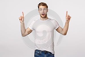 You certainly need download it. Amuased attractive and excited, astounded blond cute bearded man in white t-shirt