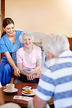 You dont stand a chance. seniors playing cards in their retirement home.