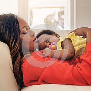 You are far more precious than jewels. a baby girl lying on her mothers chest.