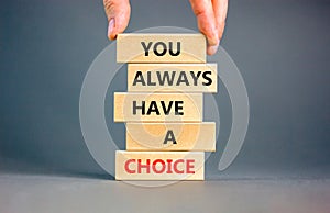 You always have choice symbol. Concept words You always have a choice on wooden block. Beautiful grey table grey background.