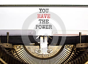 You have the power symbol. Concept word You have the power typed on beautiful old retro typewriter. Beautiful white paper