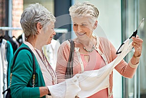 You know what I always say...Buy it. a two senior women out on a shopping spree.