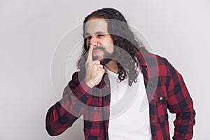 You are liar. angry man with beard and black long curly hair in