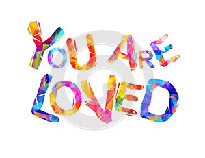 You are loved. Inscription of triangular letters