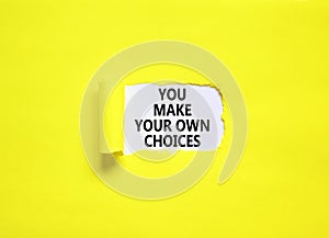 You make your own choice symbol. Concept words You make your own choice on beautiful white paper. Beautiful yellow paper