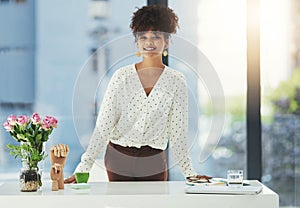 You are the most powerful force in your life. a beautiful young businesswoman working in her office.