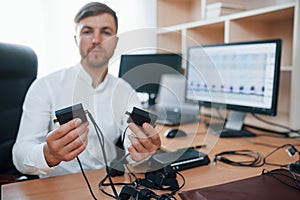 You must wear this devices. Polygraph examiner works in the office with his lie detector`s equipment