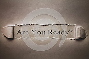 Are You Ready text on torn paper. photo