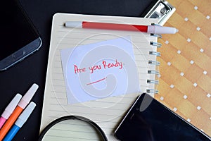 Are you Ready word written on paper. Are you Ready text on workbook, technology business concept