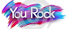 You rock paper word sign with colorful spectrum paint brush strokes over white