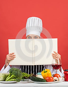 You are what you eat. woman chef read cookbook. Can be used for cooking. Food studio in restaurant. Chef preparing