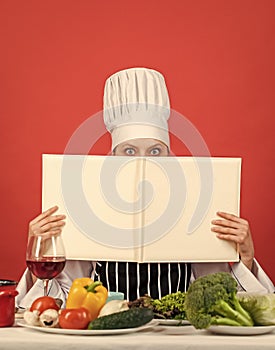 you are what you eat. woman chef read cookbook. Can be used for cooking. Food studio in restaurant. Chef preparing