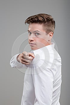 You! White shirt, backward glance, cool, collected demeanor