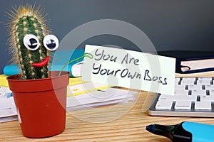 You are your own boss sign on the desk