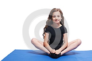 Youga relaxation class. Lotus zen pose. Little girl portrait. Meditate streching