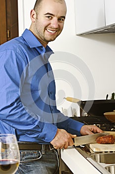 Yougn man in the kitchen