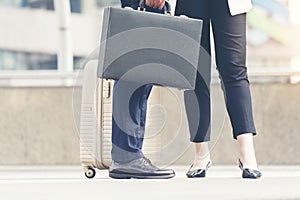 Young active business people walking up stair to go to work in modern city. Crowded group of people in big city lifestyle with