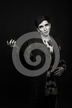 The young actor on a dark background