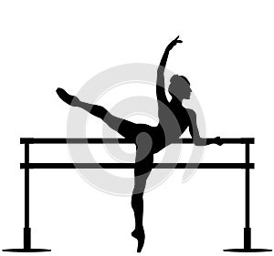 Young adult ballet dancer trains on one leg, dances a choreography at a freestanding ballet facility Ballett Barre, freestanding b