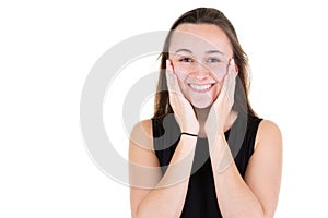 Young adult beautiful portrait woman hands on face with side copyspace