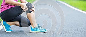 Young adult female with muscle pain during running. runner have ache due to Runners Knee or Patellofemoral Pain Syndrome,