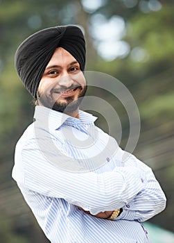 Young adult indian sikh man