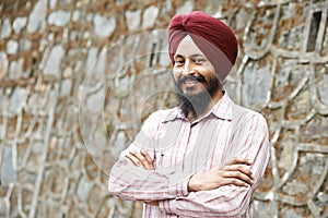 Young adult indian sikh man photo