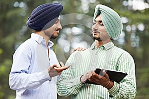 Young adult indian sikh men