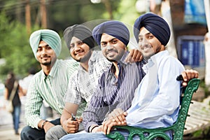 Young adult indian sikh men