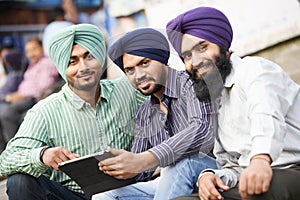 Young adult indian sikh men photo